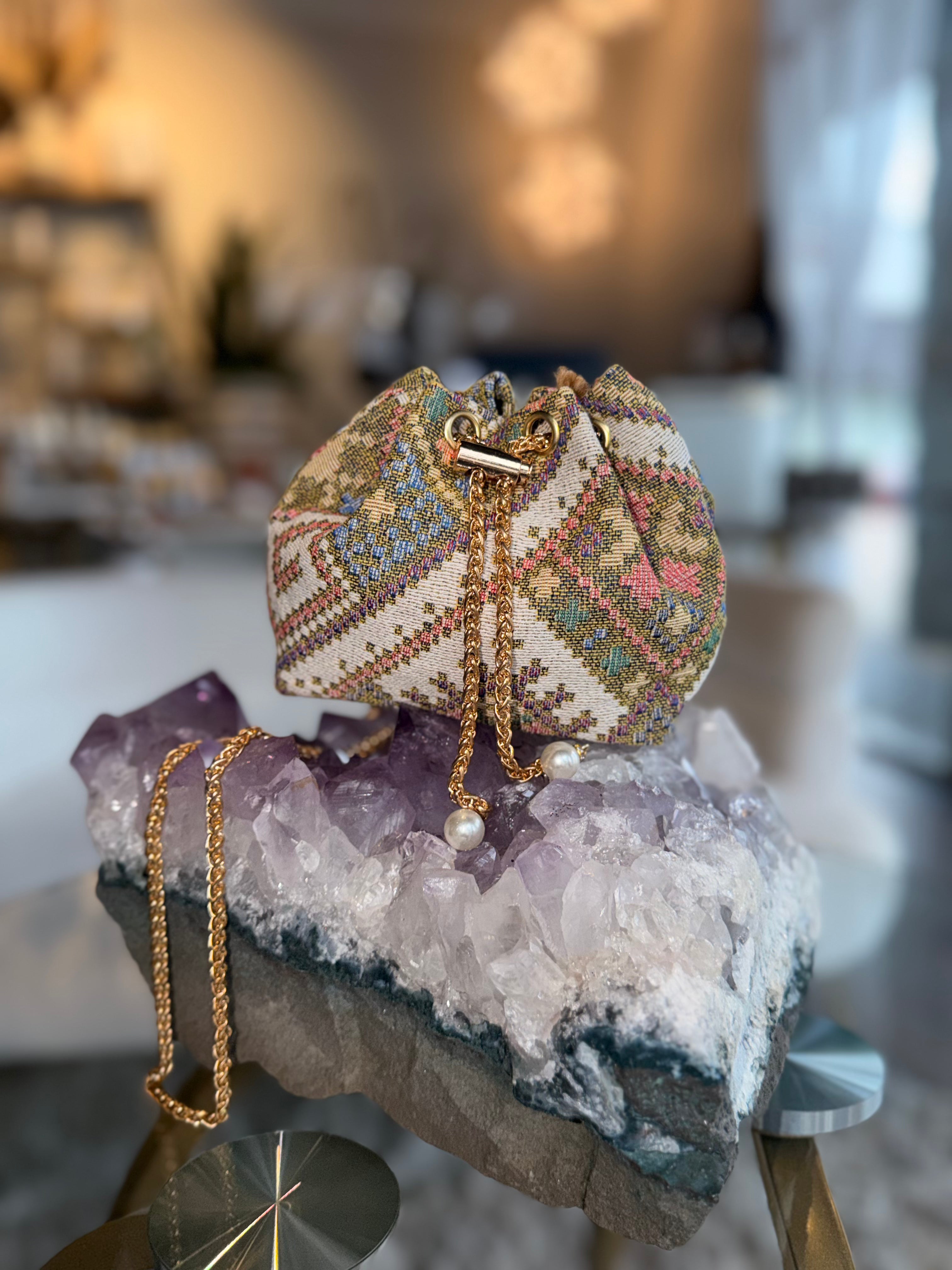 Embroidered Drawstring Handbag with Gold Chain Strap