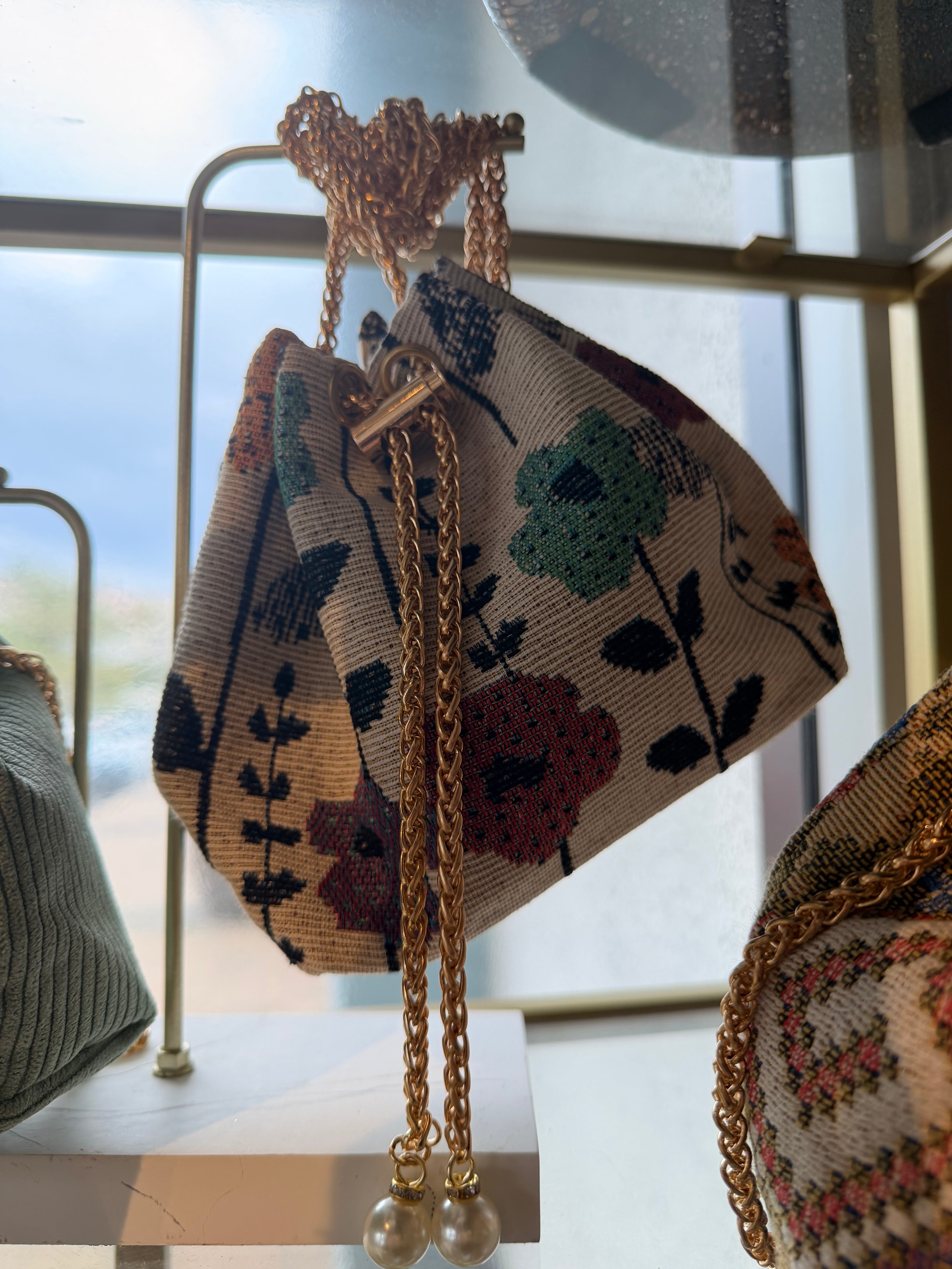 Embroidered Drawstring Handbag with Gold Chain Strap