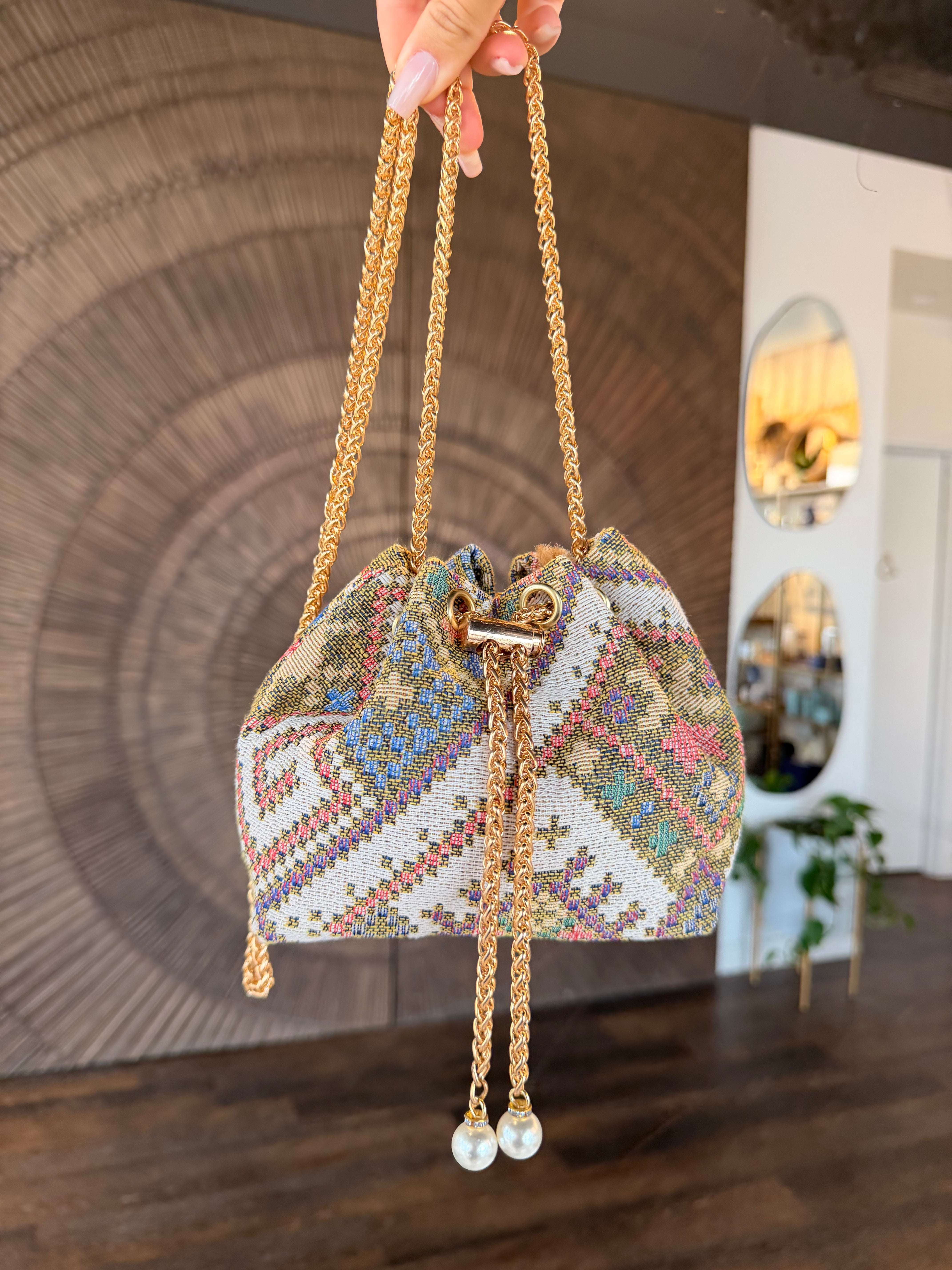 Embroidered Drawstring Handbag with Gold Chain Strap